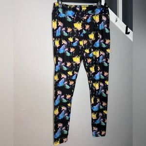 154: PreLoved Lush women’s Leggings with Black Unicorn and Multicolor Splash